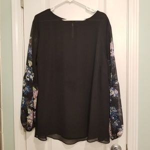 Black top with floral sleeves